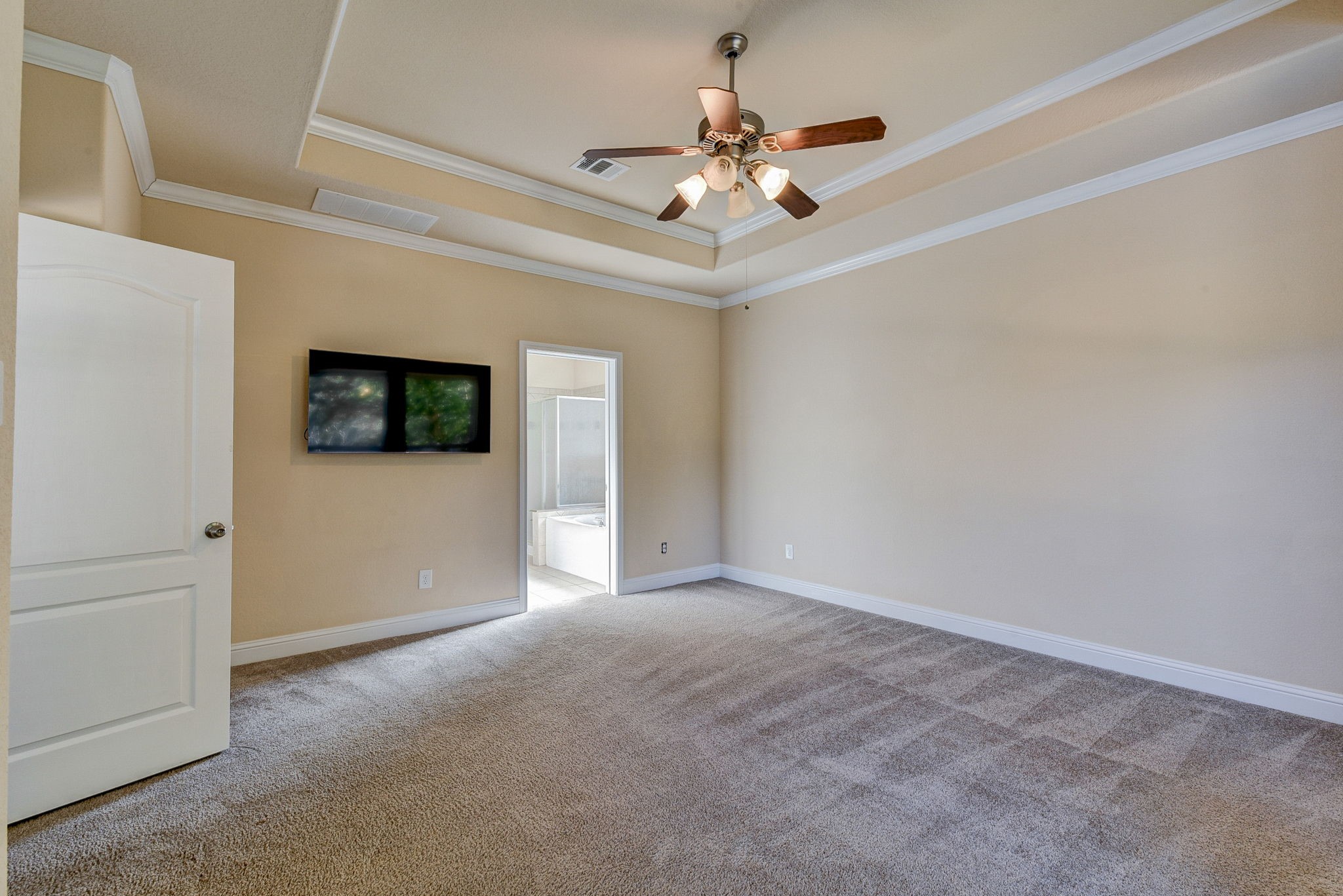 39 South Pinto Point Circle Spring, TX 77389 - Photo 24 of 48 a view of an empty room with a chandelier fan