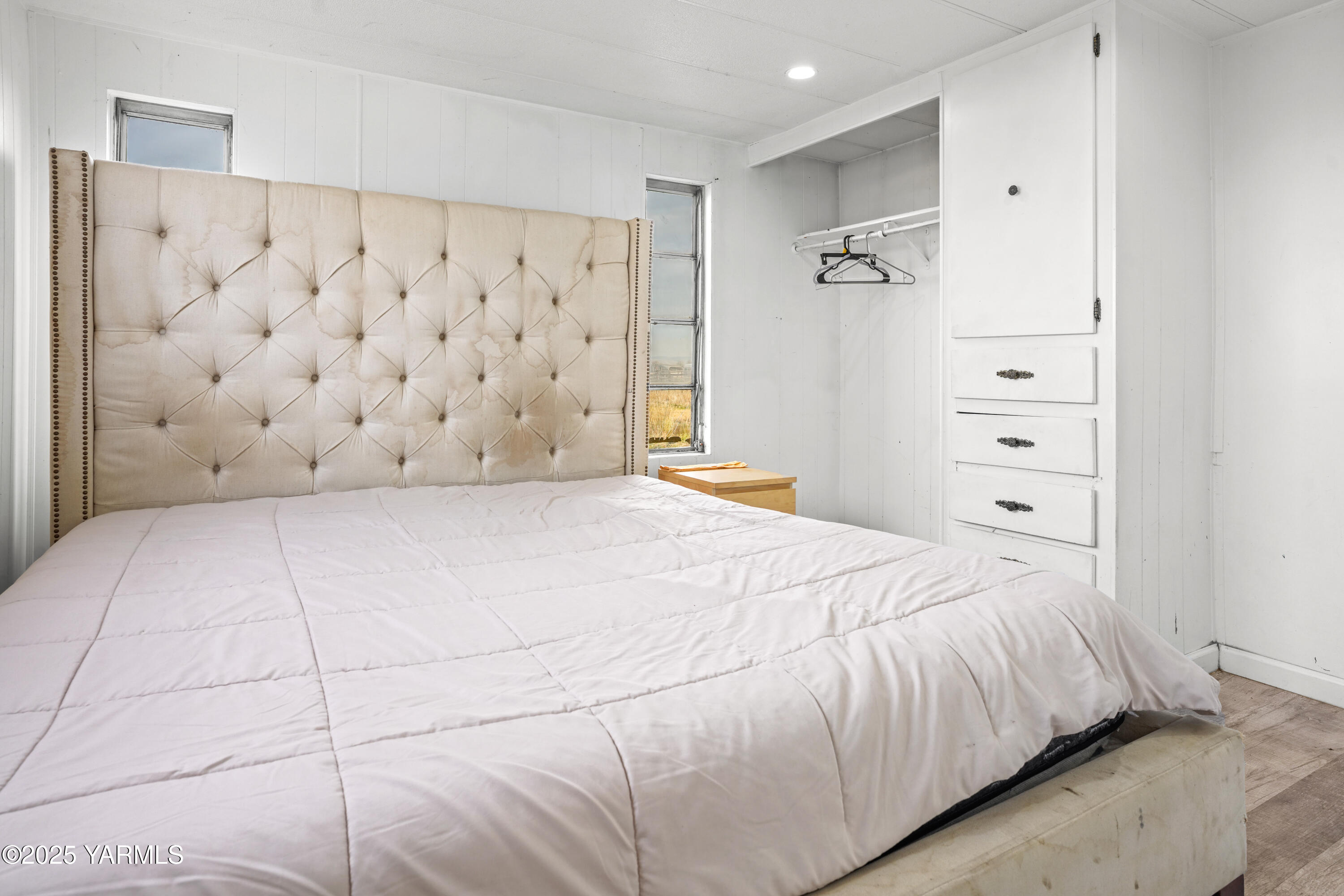 1081 Tecumseh Road White Swan, WA 98952 - Photo 11 of 16 a bedroom with a bed and a shower