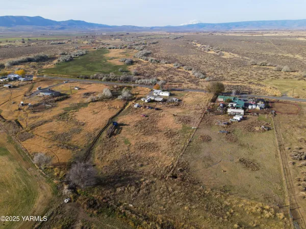 a aerial view of a house with a lake view