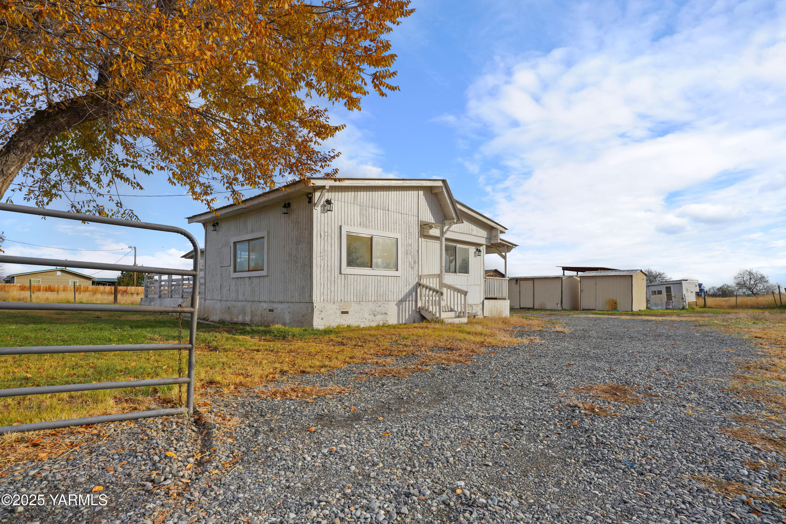 1081 Tecumseh Road White Swan, WA 98952 - Photo 3 of 16 a view of a house with a yard
