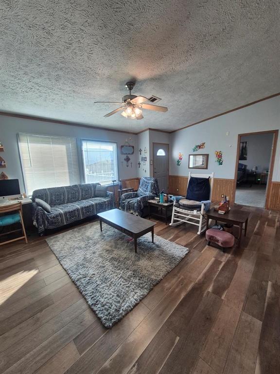 438 Silver River Road Gholson, TX 76705 - Photo 23 of 39 a living room with furniture and a flat screen tv