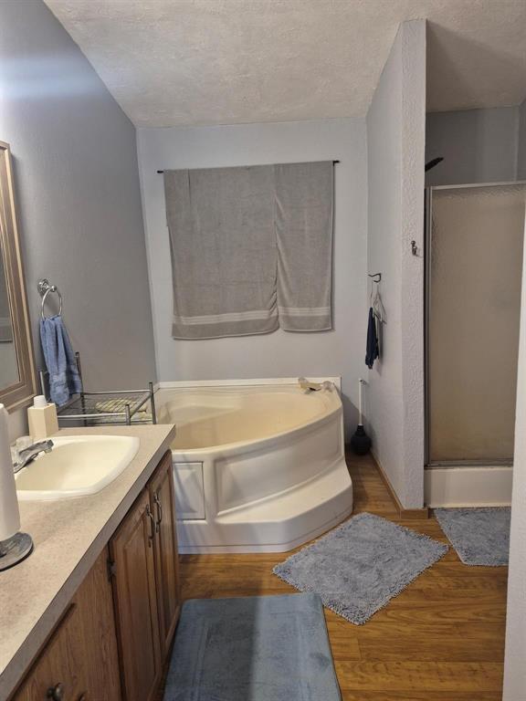 438 Silver River Road Gholson, TX 76705 - Photo 33 of 39 a bathroom with a tub sink and mirror