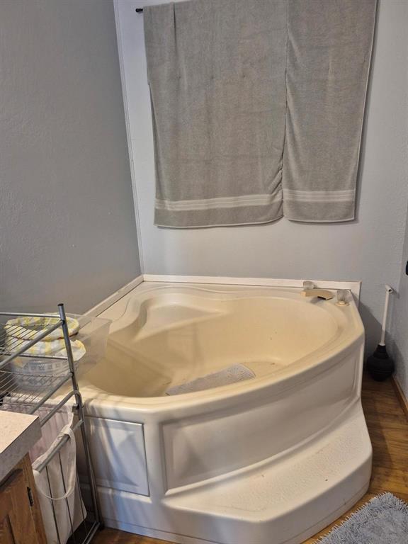 438 Silver River Road Gholson, TX 76705 - Photo 35 of 39 a bathroom with a bathtub