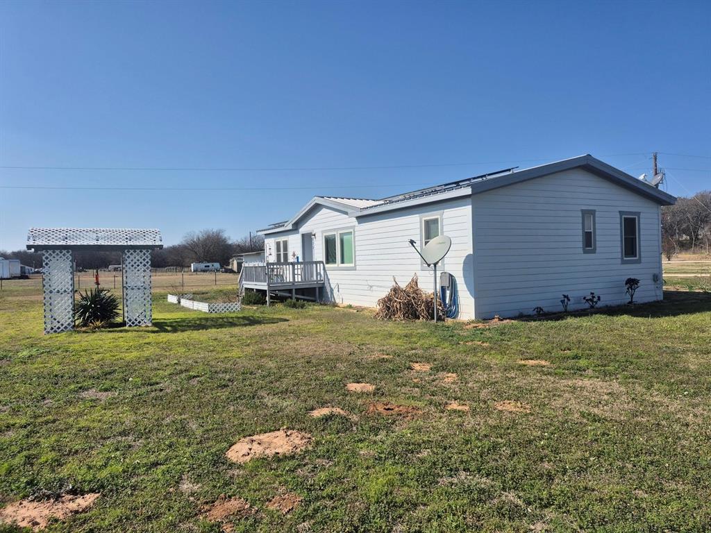 438 Silver River Road Gholson, TX 76705 - Photo 4 of 39 a house view with a garden space