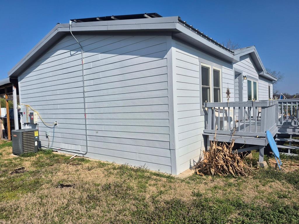 438 Silver River Road Gholson, TX 76705 - Photo 5 of 39 a view of a house with a yard