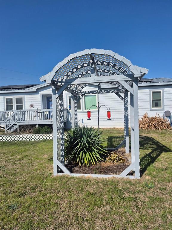 438 Silver River Road Gholson, TX 76705 - Photo 6 of 39 a front view of a house with garden