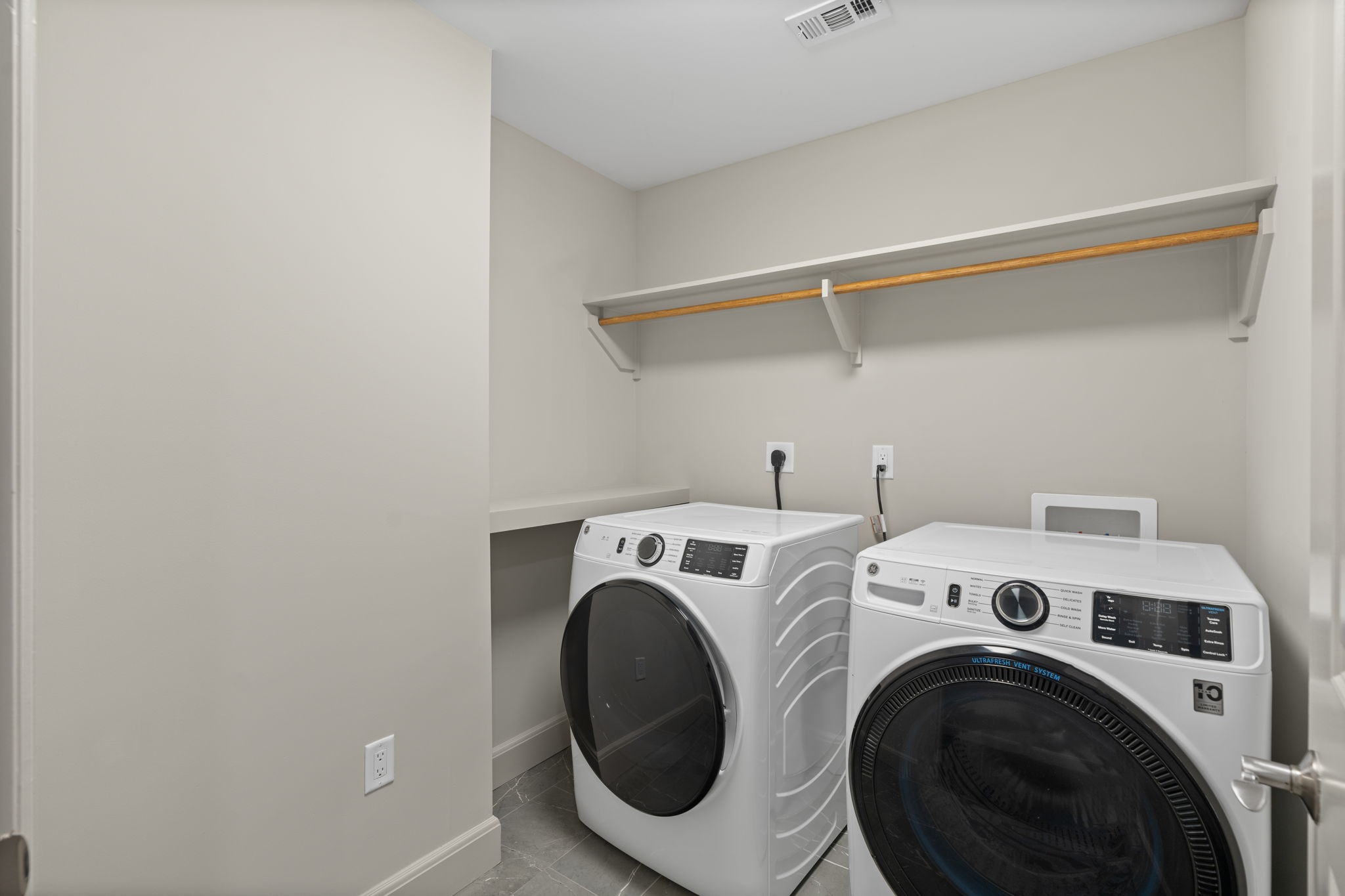 2511 Willowick Road, Unit 539 Houston, TX 77027 - Photo 13 of 45 a utility room with dryer and washer