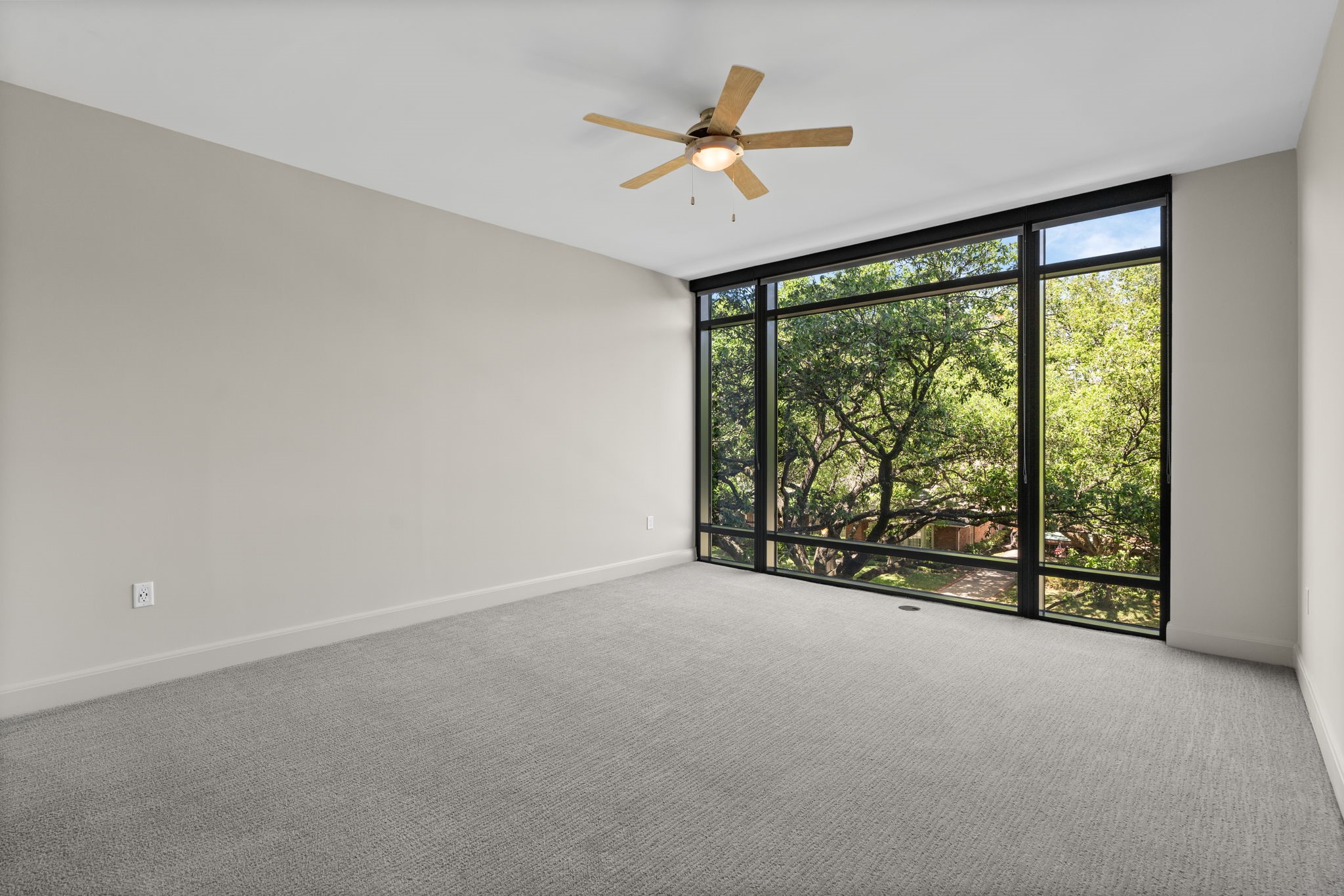 2511 Willowick Road, Unit 539 Houston, TX 77027 - Photo 15 of 45 a view of an empty room with a window