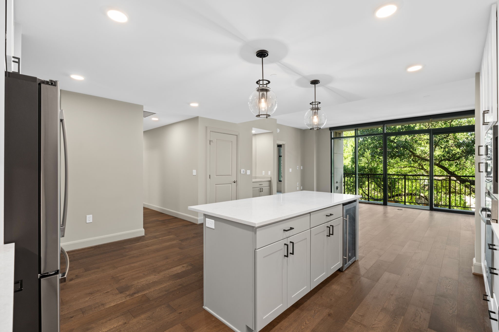 2511 Willowick Road, Unit 539 Houston, TX 77027 - Photo 5 of 45 a view of a kitchen with a sink and a large window