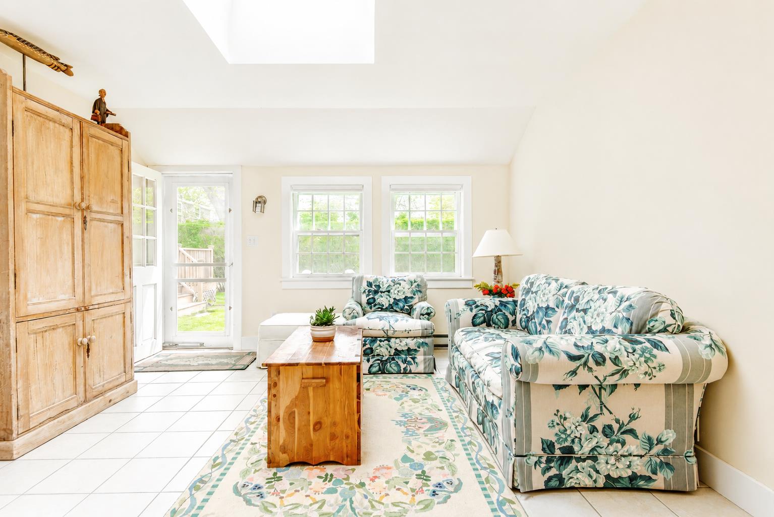 12 King Street Nantucket, MA 02554 - Photo 25 of 32 a living room with furniture and a large window