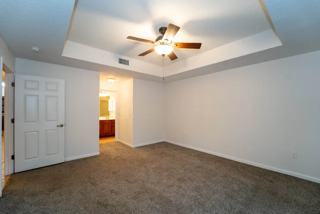 a view of a hallway with a furniture