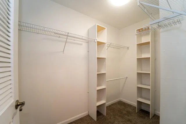 a balcony with trees in front of it