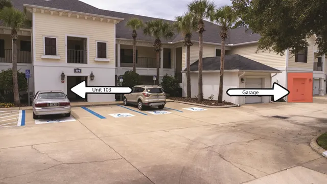 a living room with furniture a dining table and chairs with kitchen view