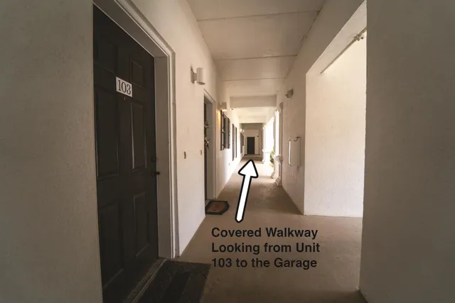 an aerial view of multiple houses with yard