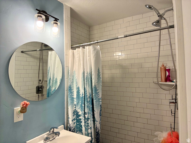 175 Eagle Street Eureka, UT 84628 - Photo 18 of 31 Full bathroom featuring a stall shower and vanity