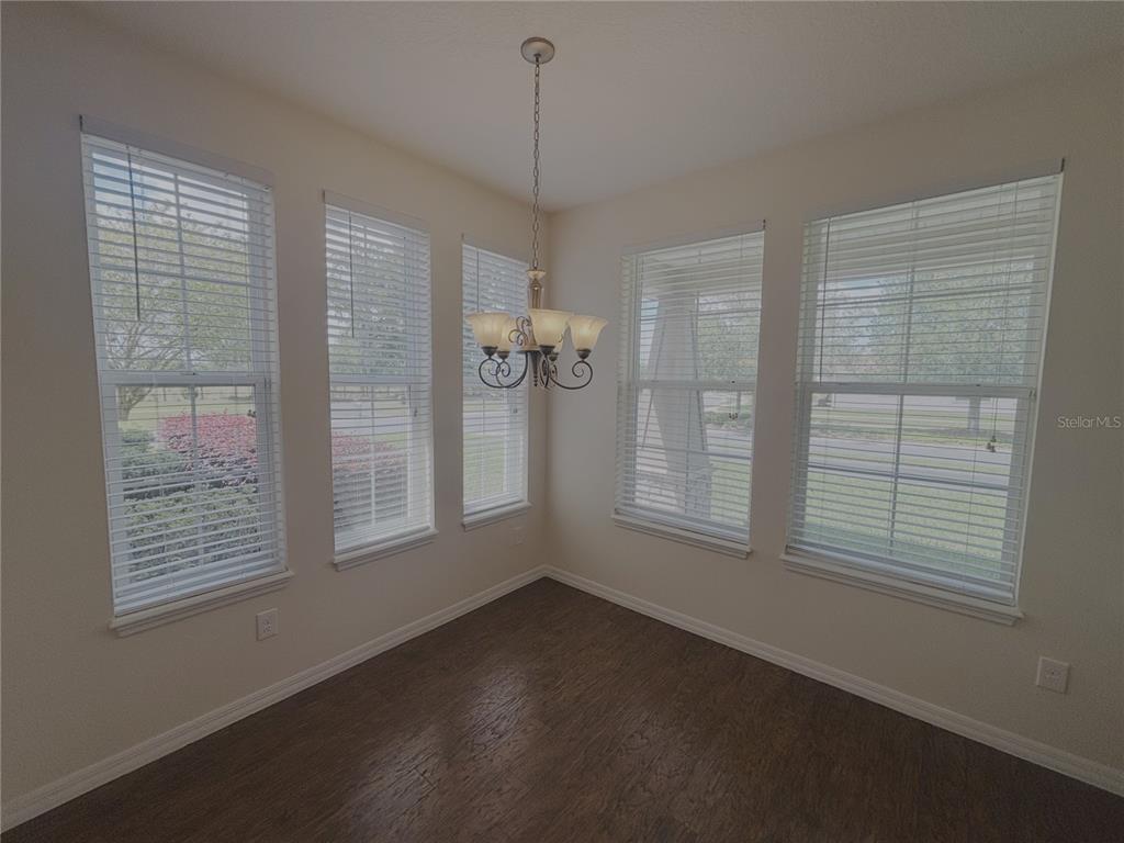 4859 Northwest 35th Ln Road Ocala, FL 34482 - Photo 11 of 30 an empty room with windows and closet