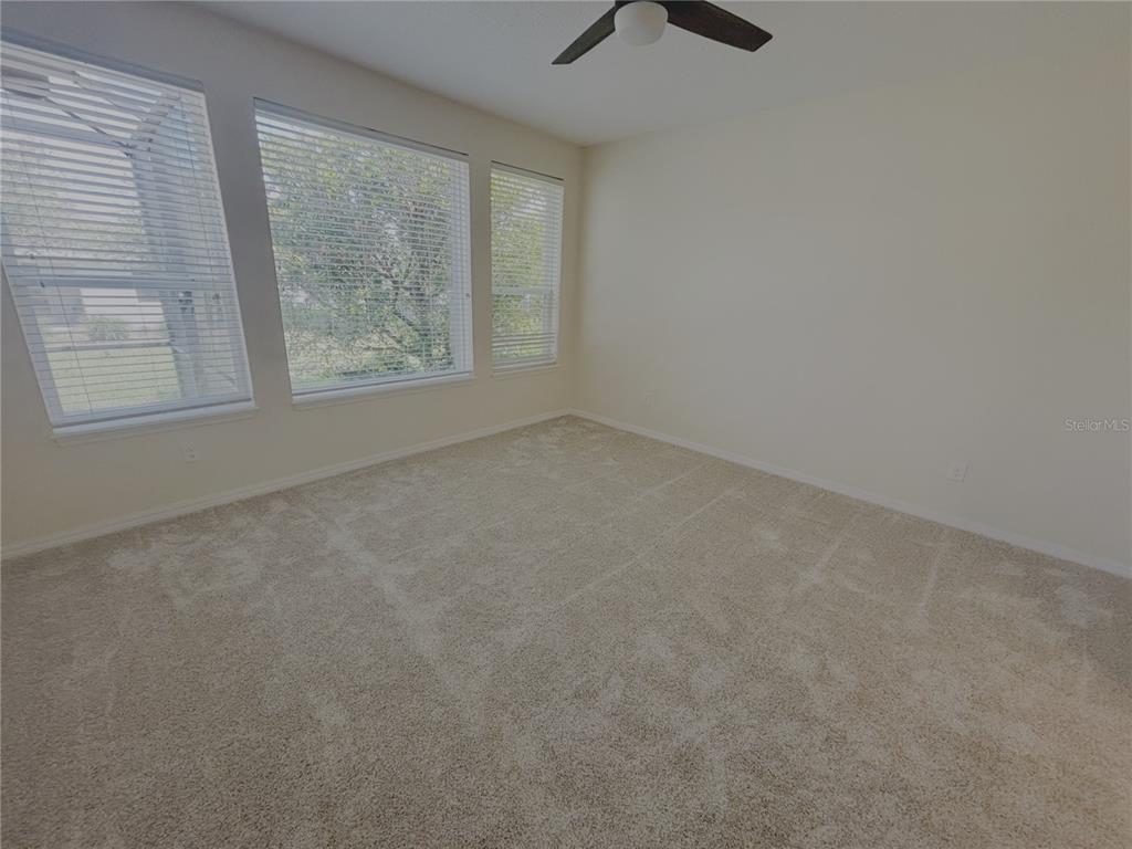 4859 Northwest 35th Ln Road Ocala, FL 34482 - Photo 14 of 30 an empty room with a window