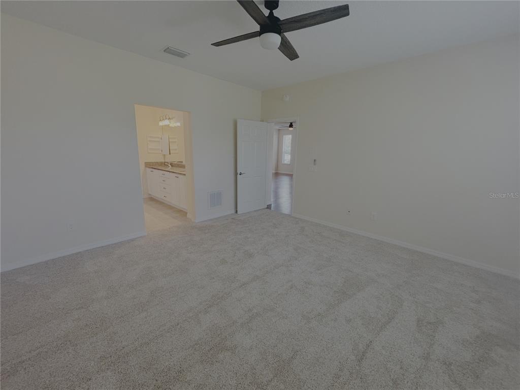 4859 Northwest 35th Ln Road Ocala, FL 34482 - Photo 15 of 30 a view of a room with a ceiling fan