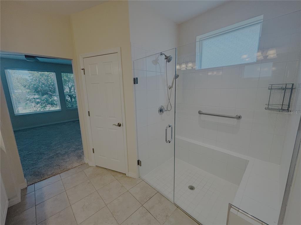 4859 Northwest 35th Ln Road Ocala, FL 34482 - Photo 18 of 30 a bathroom with a shower