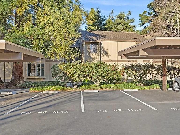 a view of a street with a building in the background