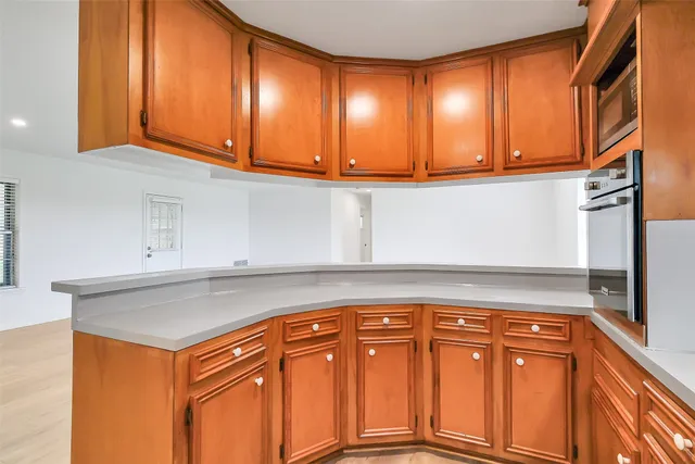 a view of a sink and cabinets