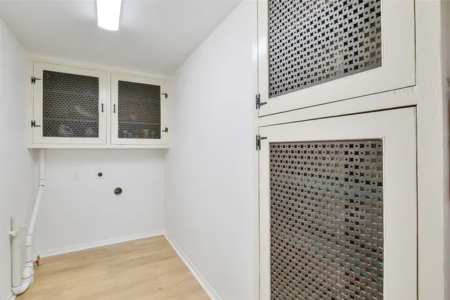 a view of an empty room with a balcony