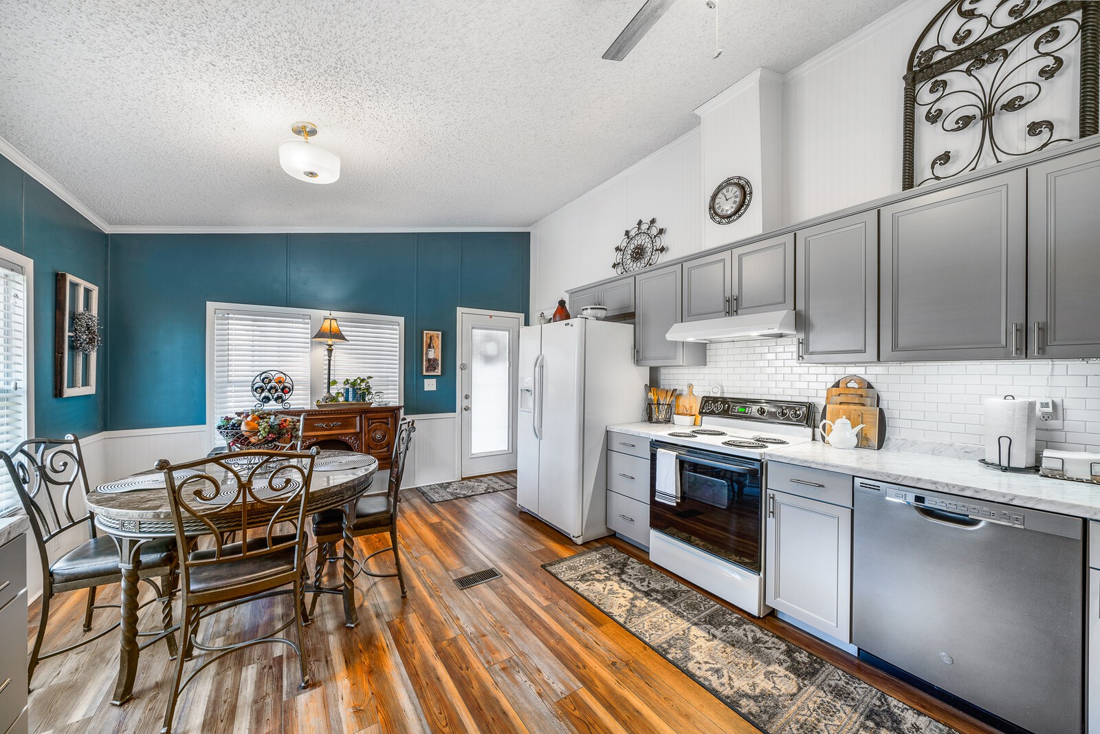 270 Allen's Chapel Road Smithville, TN 37166 - Photo 12 of 26 a kitchen with granite countertop a sink appliances and cabinets