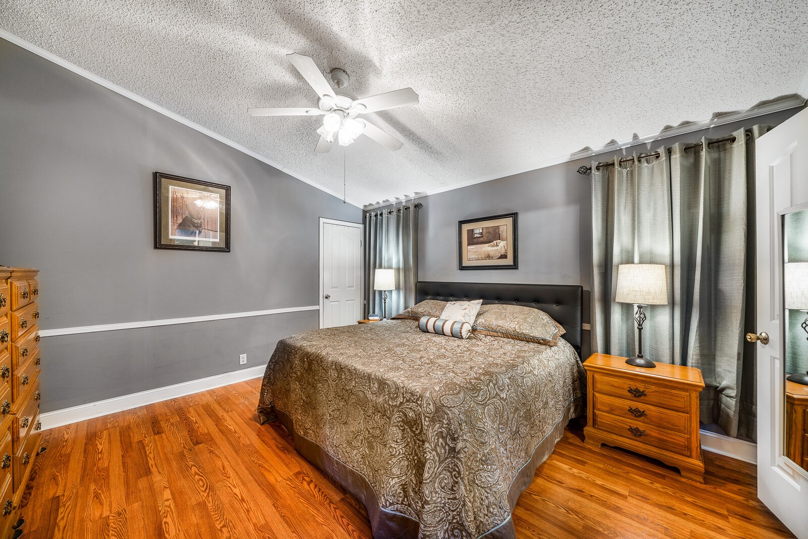 270 Allen's Chapel Road Smithville, TN 37166 - Photo 14 of 26 a bedroom with a bed and a chandelier