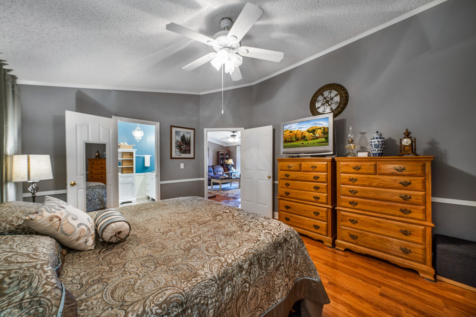 270 Allen's Chapel Road Smithville, TN 37166 - Photo 15 of 26 a bedroom with a bed and a chandelier