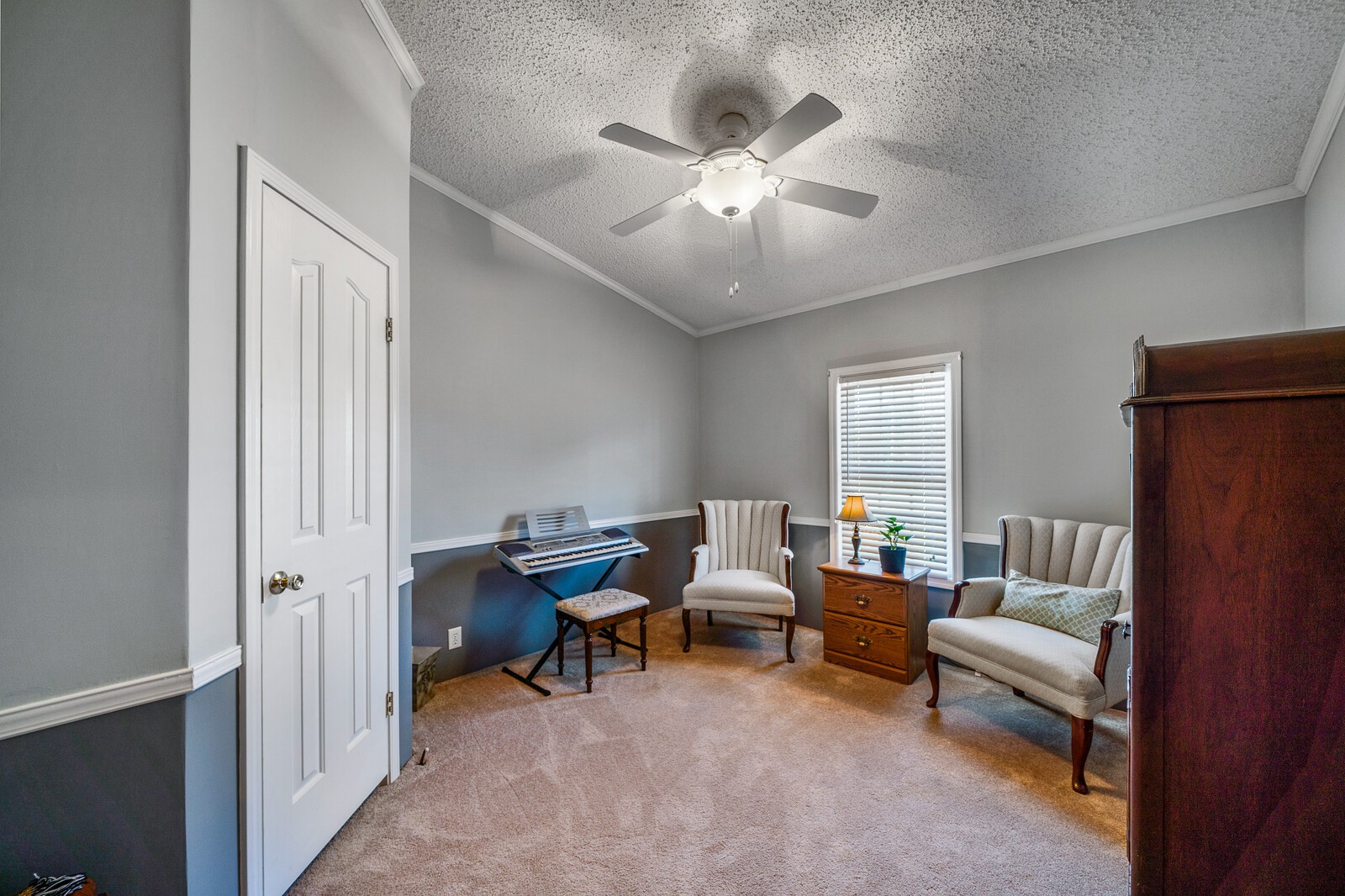 270 Allen's Chapel Road Smithville, TN 37166 - Photo 19 of 26 a living room with furniture and a chandelier