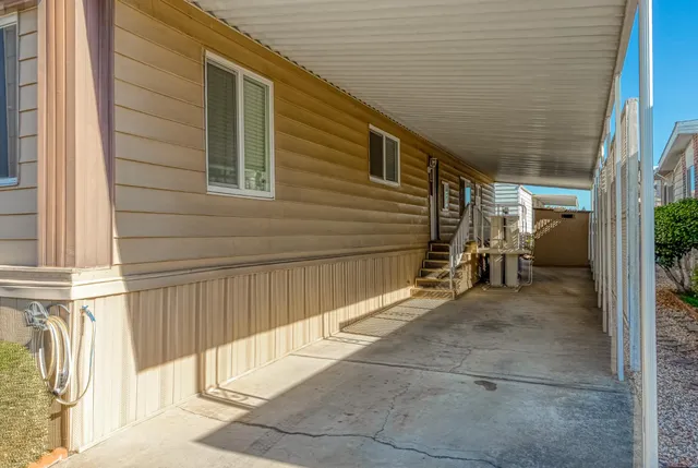 a view of a porch with furniture