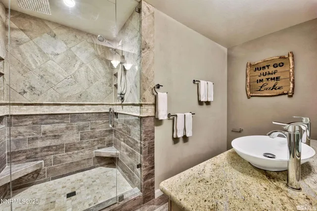 a bedroom with a bed and a desk