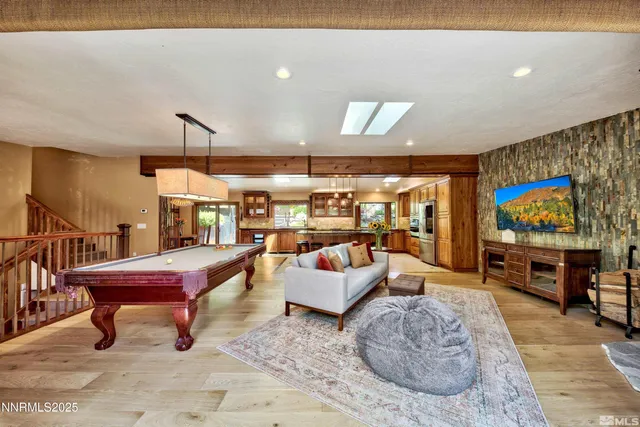 a kitchen with stainless steel appliances granite countertop a stove and a refrigerator