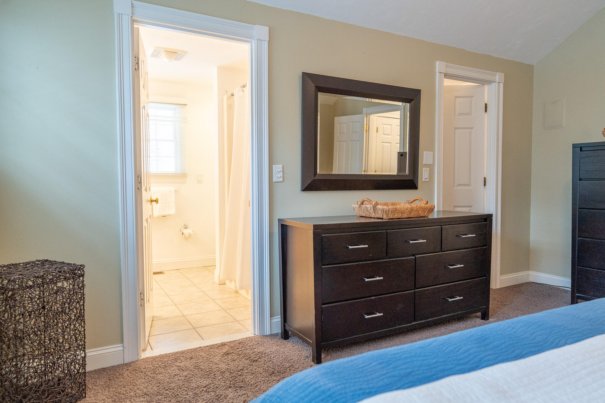 10 Abbey Gate Road Cotuit, MA 02635 - Photo 27 of 67 a bathroom with a vanity a lamp and a mirror