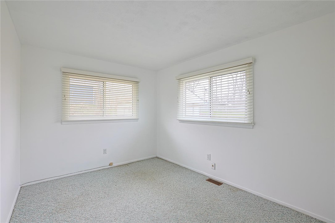 4307 Meadowcroft Road Dayton, OH 45429 - Photo 17 of 26 This bright, airy bedroom offers a serene retreat with ample natural light.