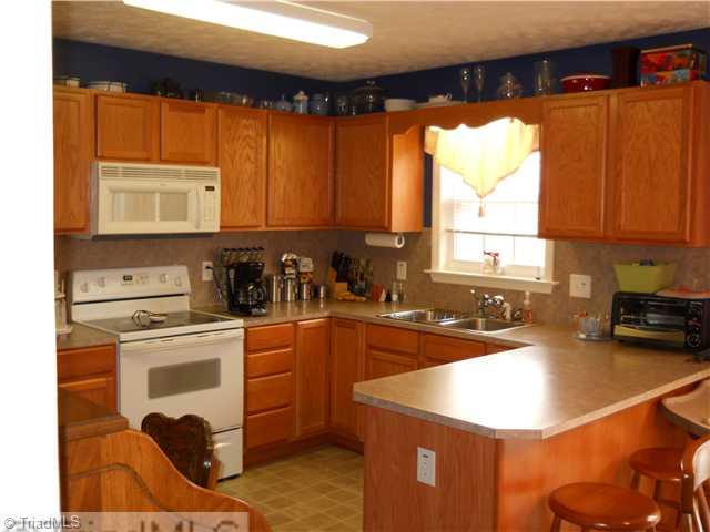 1065 Laurel Crest Road King, NC 27021 - Photo 6 of 16 Kitchen. Great Kitchen with tons of cabinets,huge pantry,all appliances remaining!