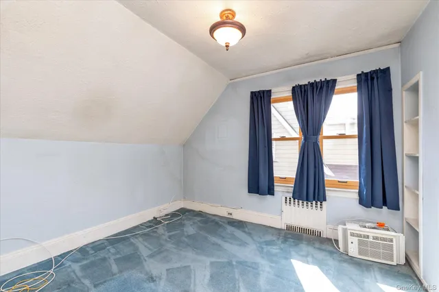 wooden floor and window in an empty room
