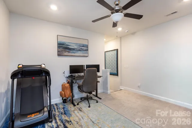 a bathroom with a double vanity sink toilet and a mirror