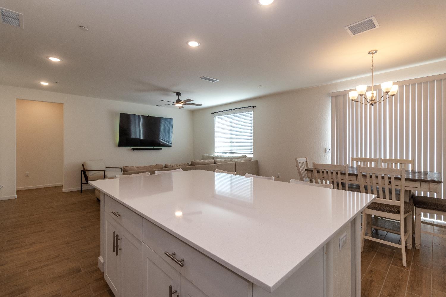 1158 Encore Way West Madera, CA 93636 - Photo 13 of 45 a kitchen with a stove a sink and a refrigerator