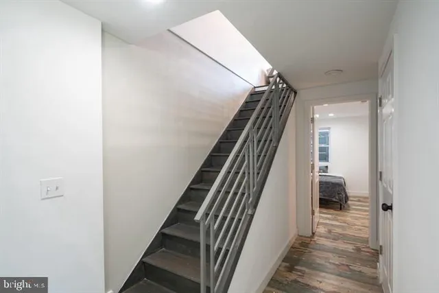 a view of a hallway view with staircase