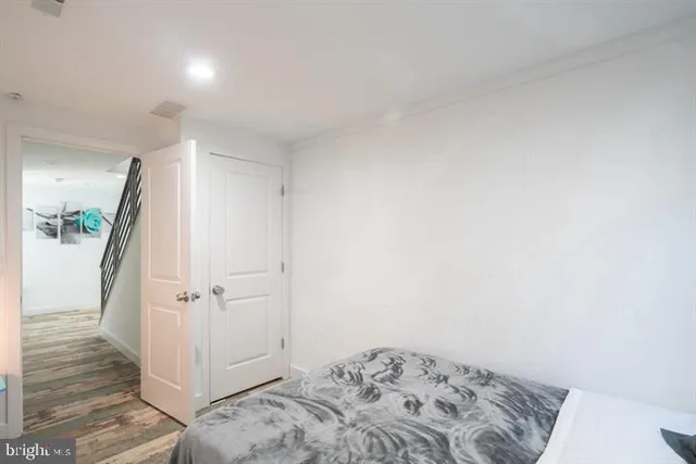 wooden floor with a rug