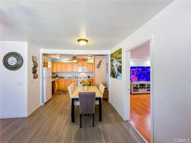 a bed room with furniture and a flat screen tv