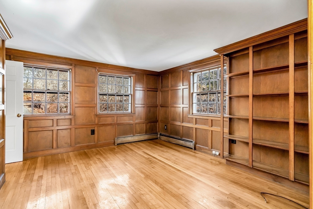 955 Hale Street Beverly, MA 01915 - Photo 13 of 32 a view of workspace with window and cabinet