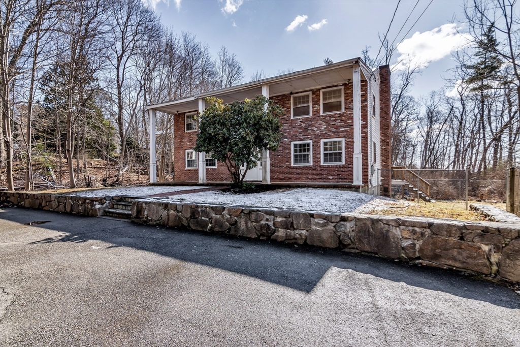 955 Hale Street Beverly, MA 01915 - Photo 5 of 32 a view of house with a yard and sitting area