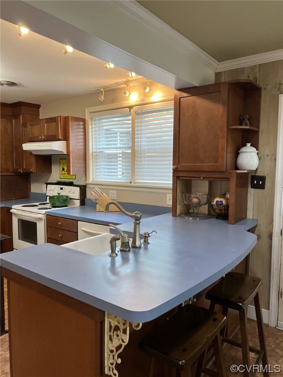 7508 Marilea Road Richmond, VA 23225 - Photo 11 of 30 Breakfast Bar at Kitchen also holds a porcelain farm sink