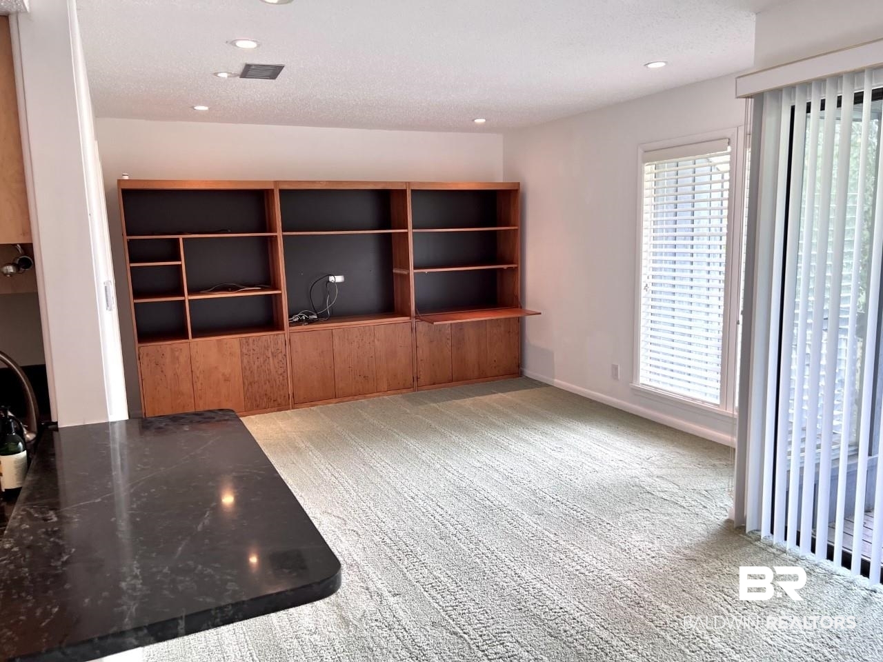 208 Golf Terrace, Unit 208 Daphne, AL 36526 - Photo 5 of 22 Cabinetry in Living Rm