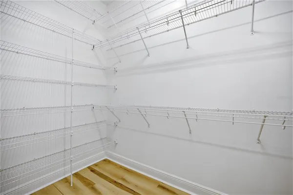a view of a room with racks on the wall