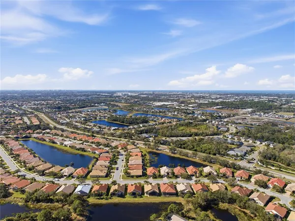 an aerial view of a city with lots of residential buildings
