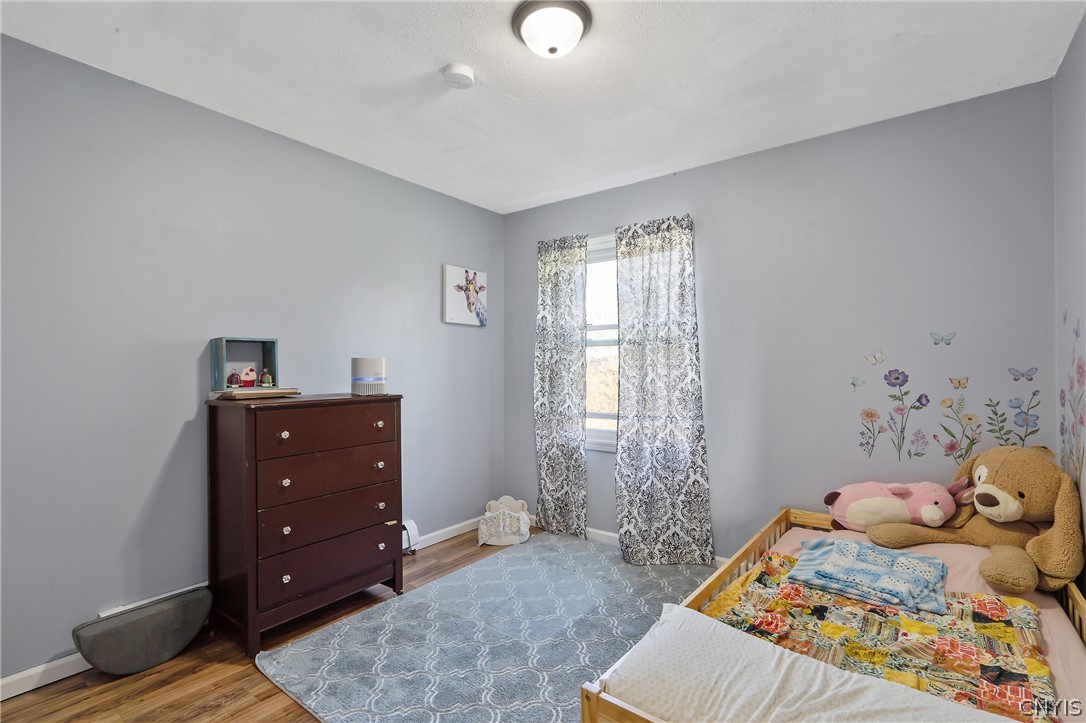 1085 Shackham Road Fabius, NY 13063 - Photo 17 of 46 Light and bright bedrooms with newer flooring