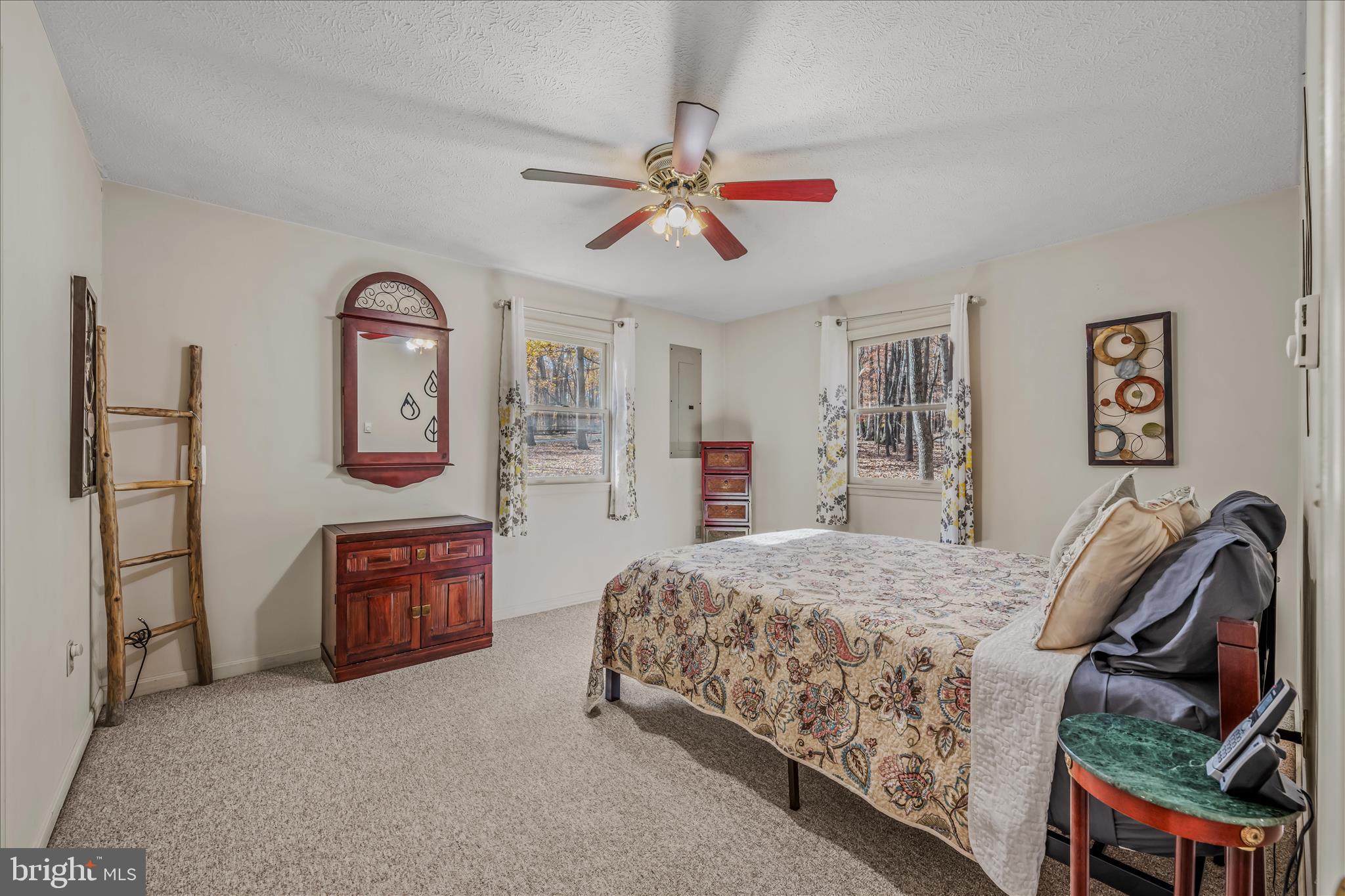 67 Tranquil Way Berkeley Springs, WV 25411 - Photo 16 of 37 a bedroom with a bed and dresser